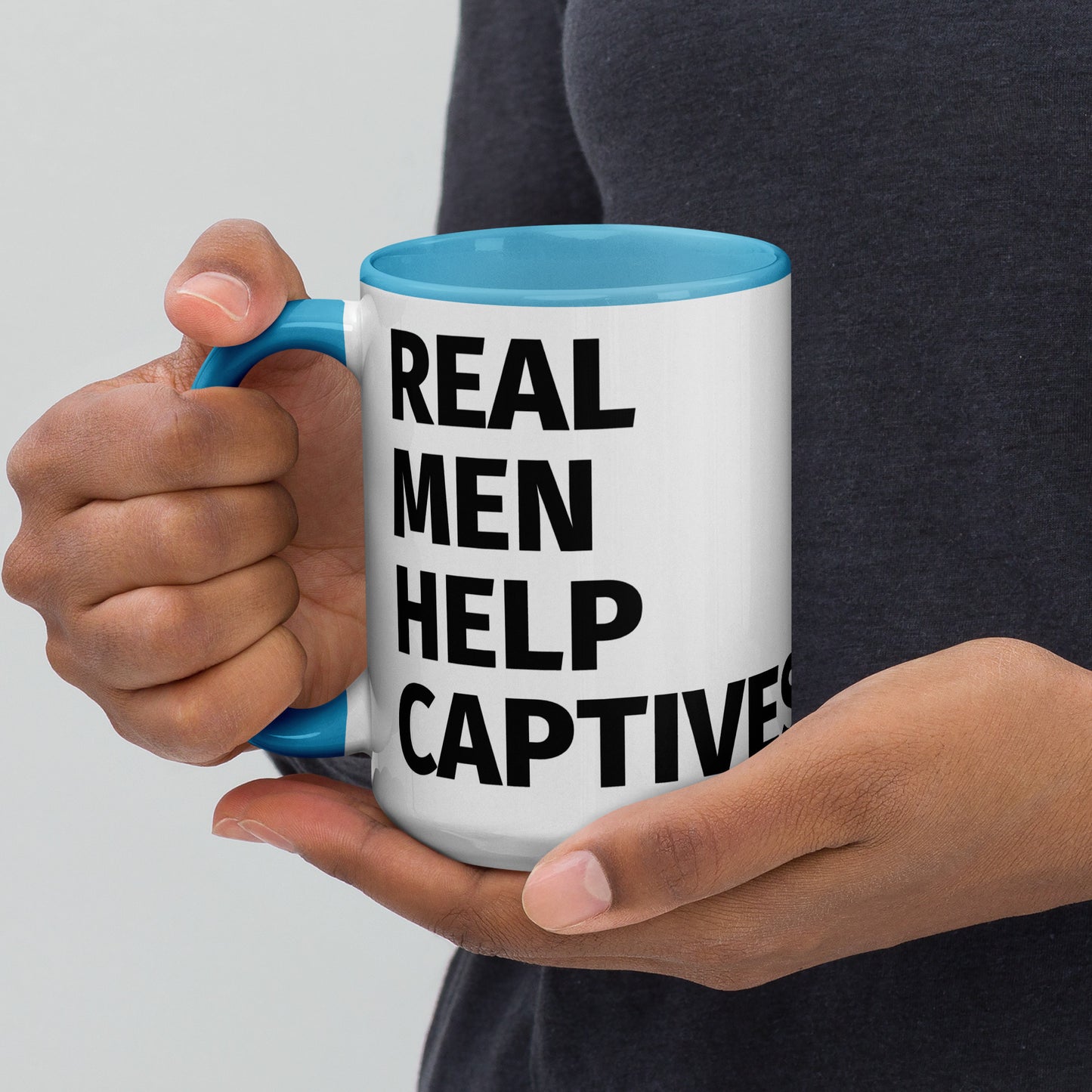 Real Men Help Captives Mug